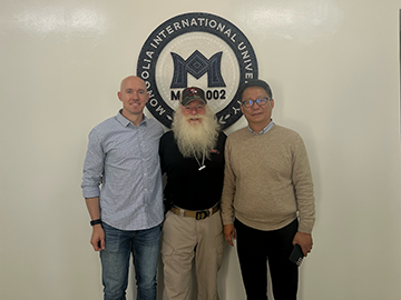 Parker Lee (Director of Admissions), Santa Max, and Dr. Oh-Moon Kwon (President of the Mongolian International University), 2022